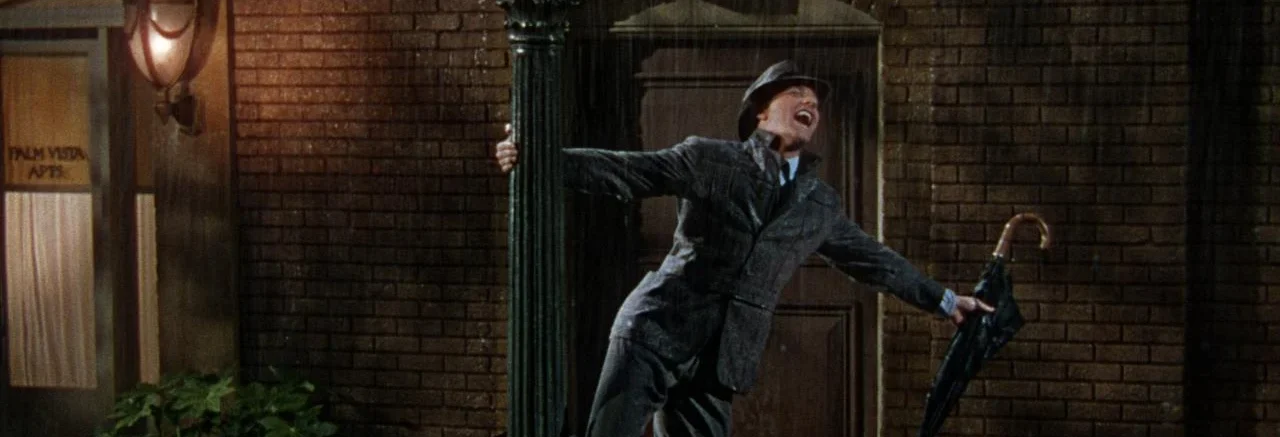 CANTANDO BAJO LA LLUVIA